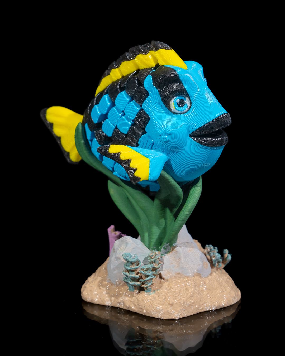 Flexi Dolores, The blue Tang fish fidget toy with stand