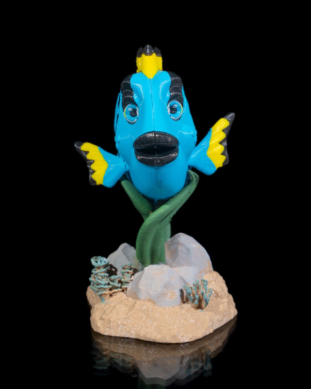 Flexi Dolores, The blue Tang fish fidget toy with stand