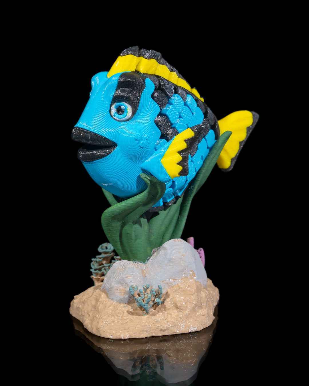 Flexi Dolores, The blue Tang fish fidget toy with stand - Myth & Motion by The Braysdown Workshop