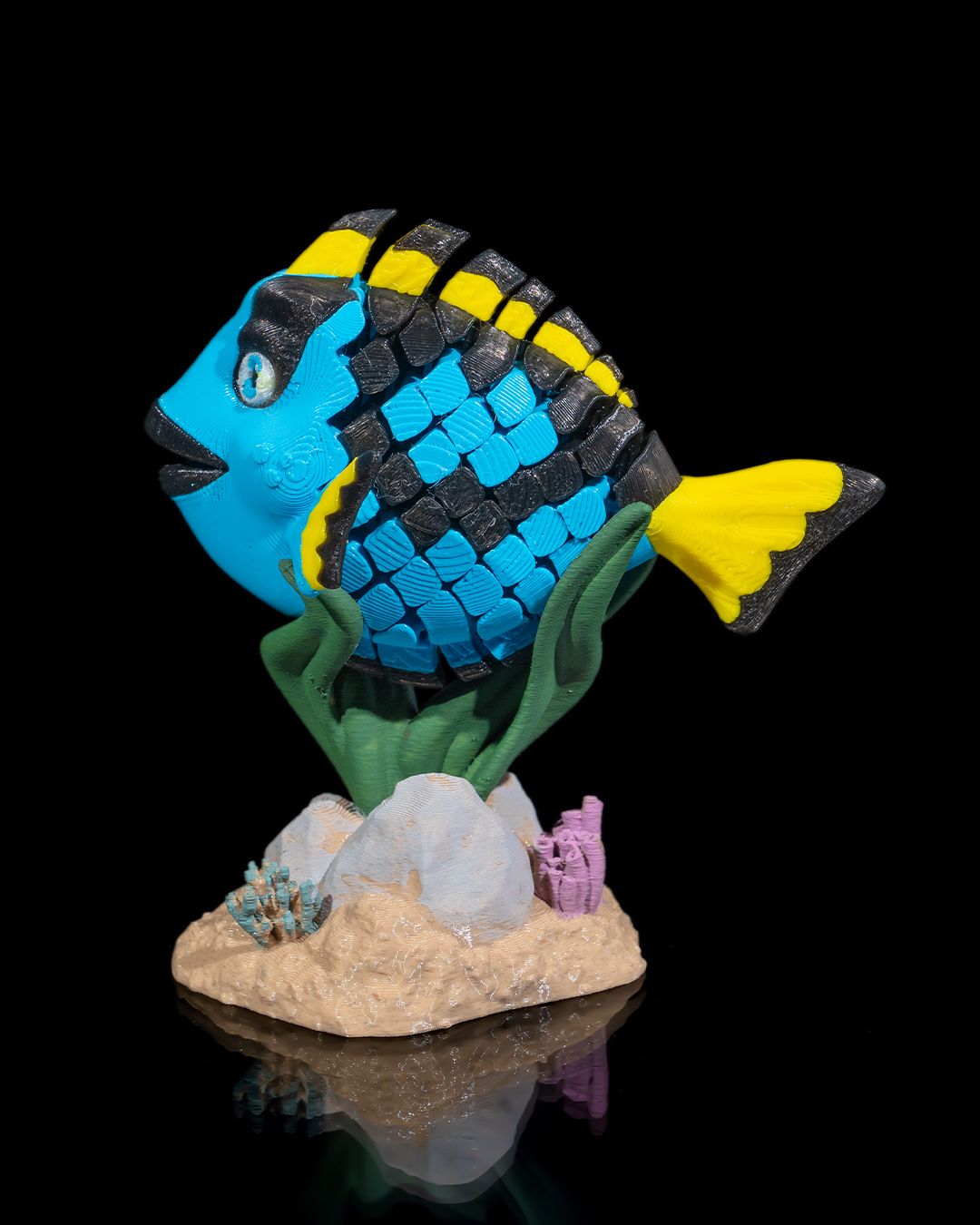 Flexi Dolores, The blue Tang fish fidget toy with stand
