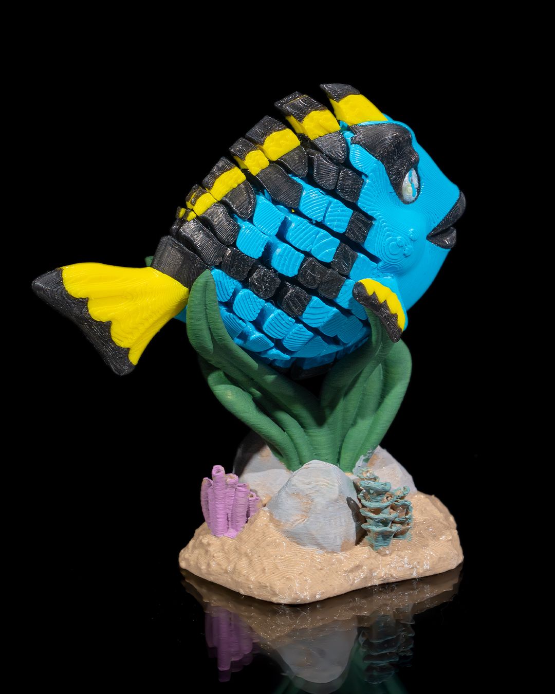 Flexi Dolores, The blue Tang fish fidget toy with stand
