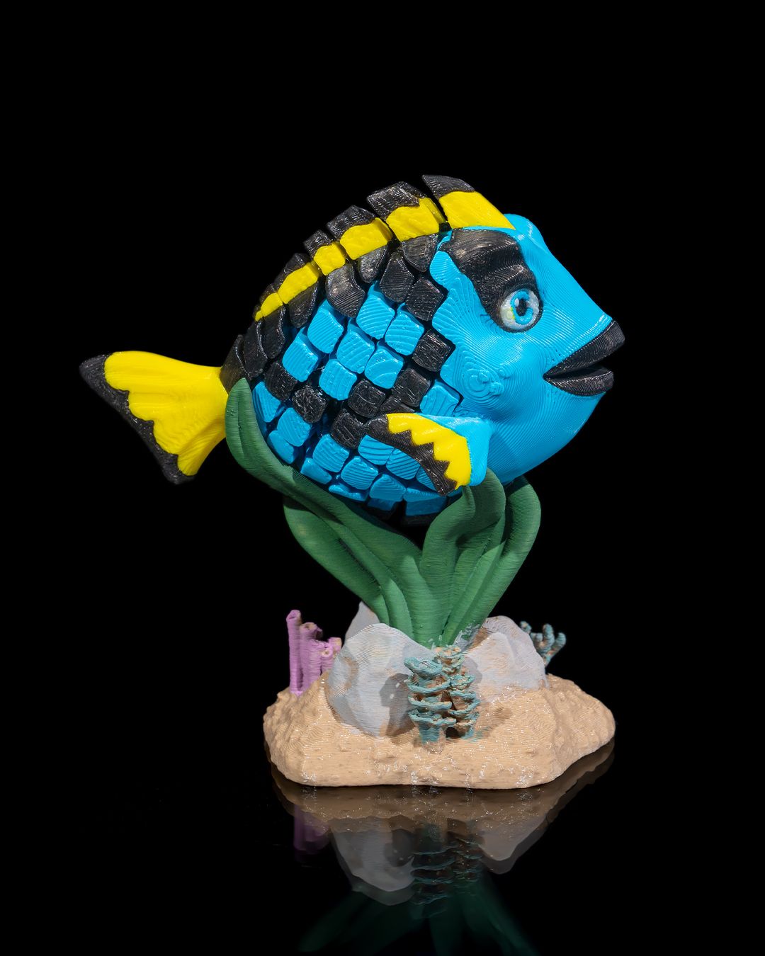 Flexi Dolores, The blue Tang fish fidget toy with stand
