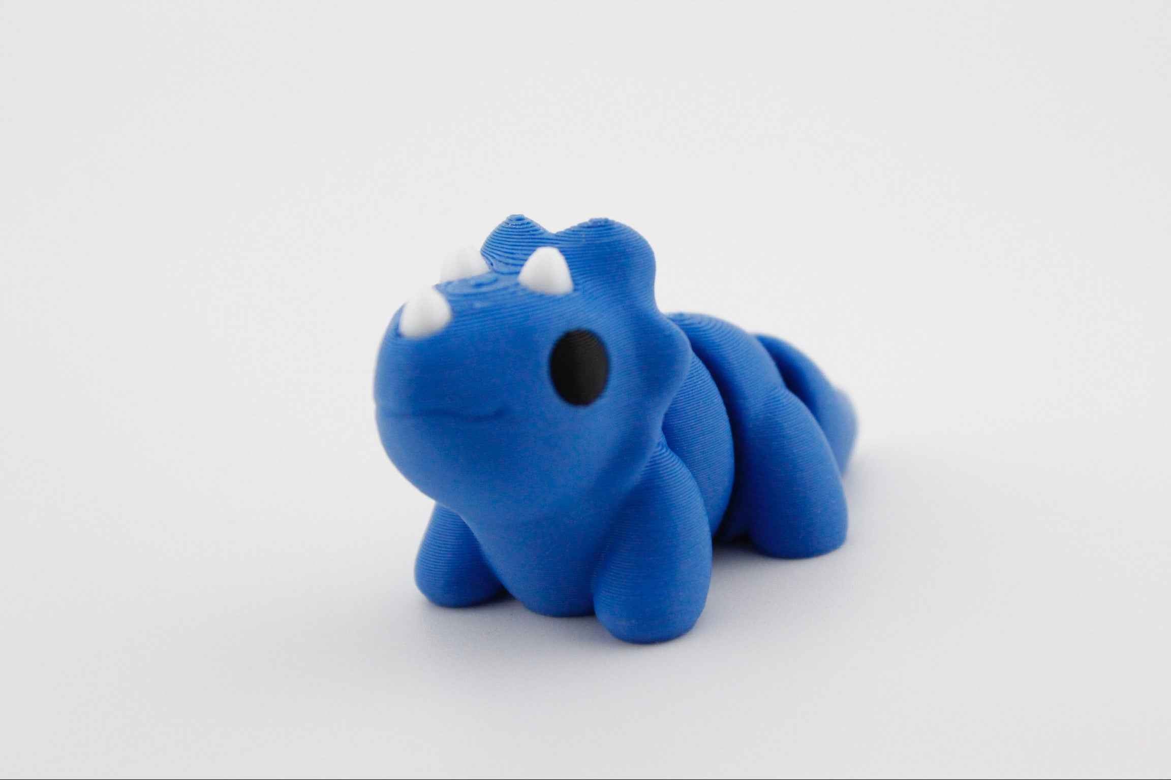 Triceratops Fidget - Charging through boredom. - Myth & Motion by The Braysdown Workshop