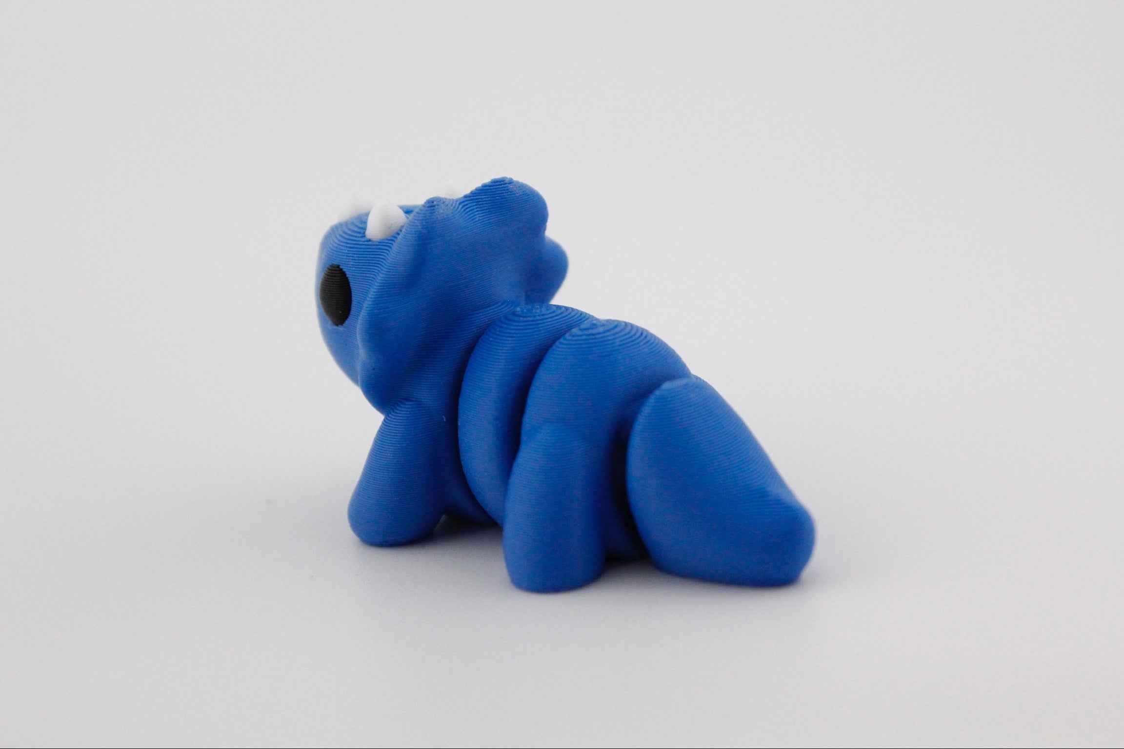 Triceratops Fidget - Charging through boredom. - Myth & Motion by The Braysdown Workshop