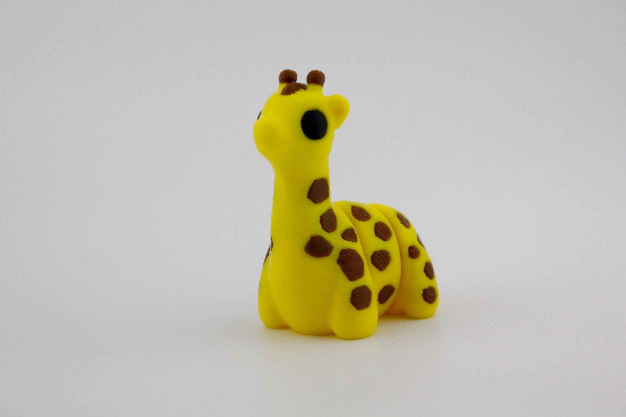 Giraffe Fidget - Stretching above the rest - Myth & Motion by The Braysdown Workshop
