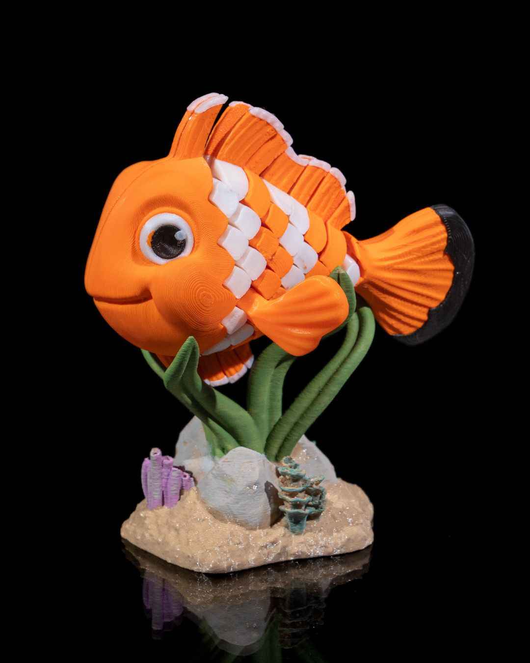 Flexi Nestor, The clownfish fidget articulated fish with stand - Myth & Motion by The Braysdown Workshop