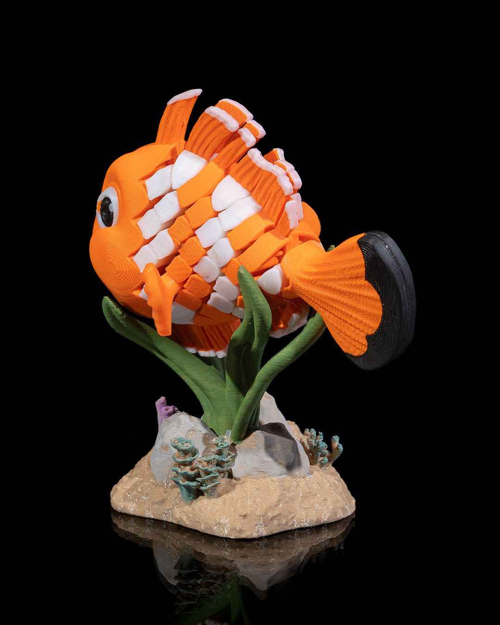 Flexi Nestor, The clownfish fidget articulated fish with stand - Myth & Motion by The Braysdown Workshop