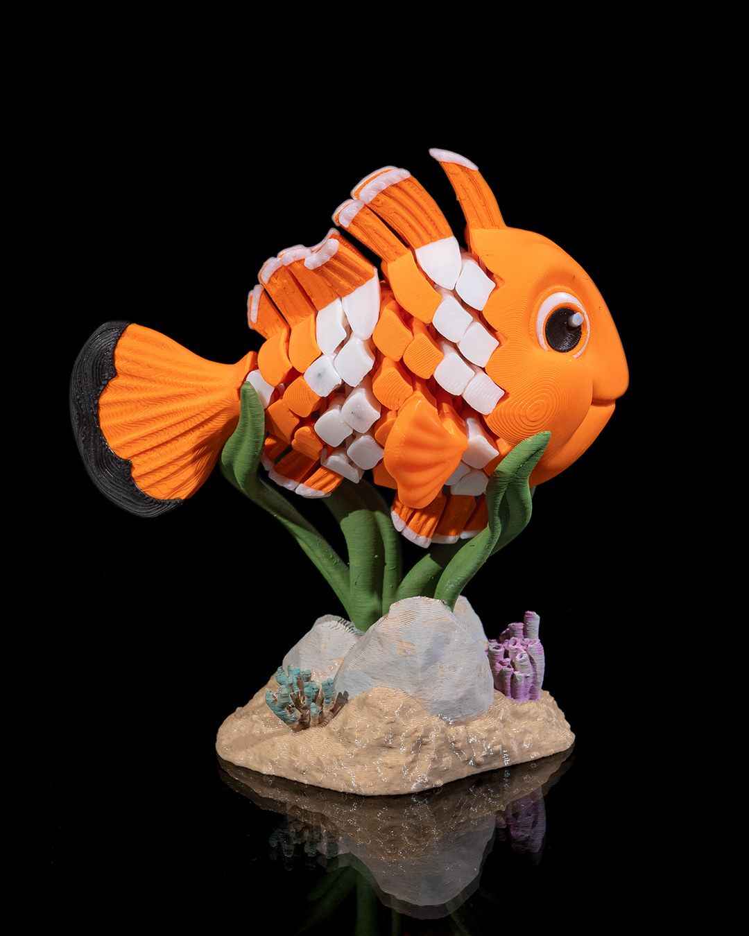 Flexi Nestor, The clownfish fidget articulated fish with stand - Myth & Motion by The Braysdown Workshop